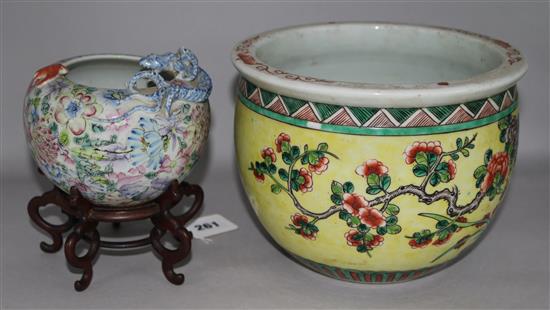 A 19th century famille rose water pot and famille vert planter